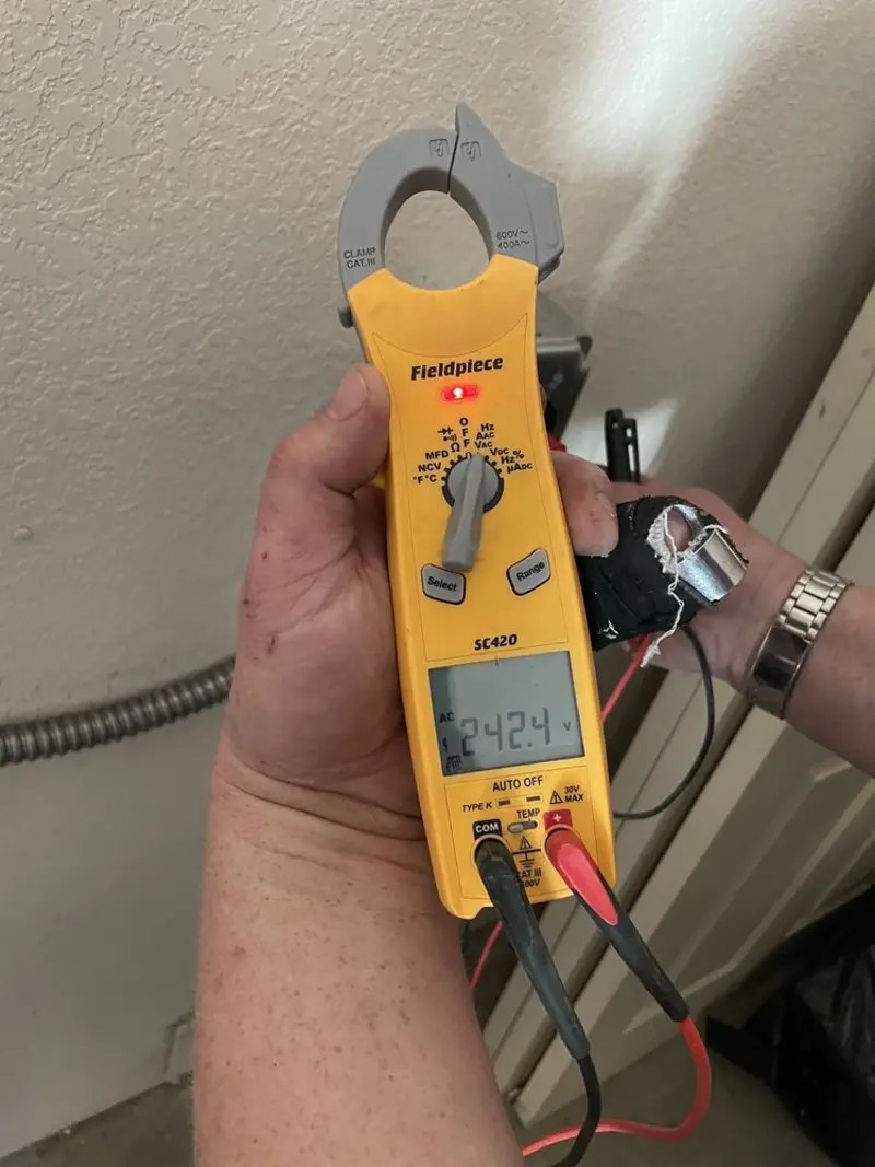 Voltage testing with clamp meter during Generator Installation in New Philadelphia